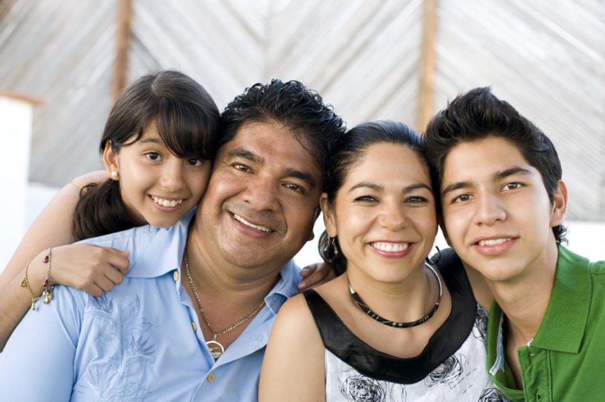 Smiling family representing DNExpress’s commitment
